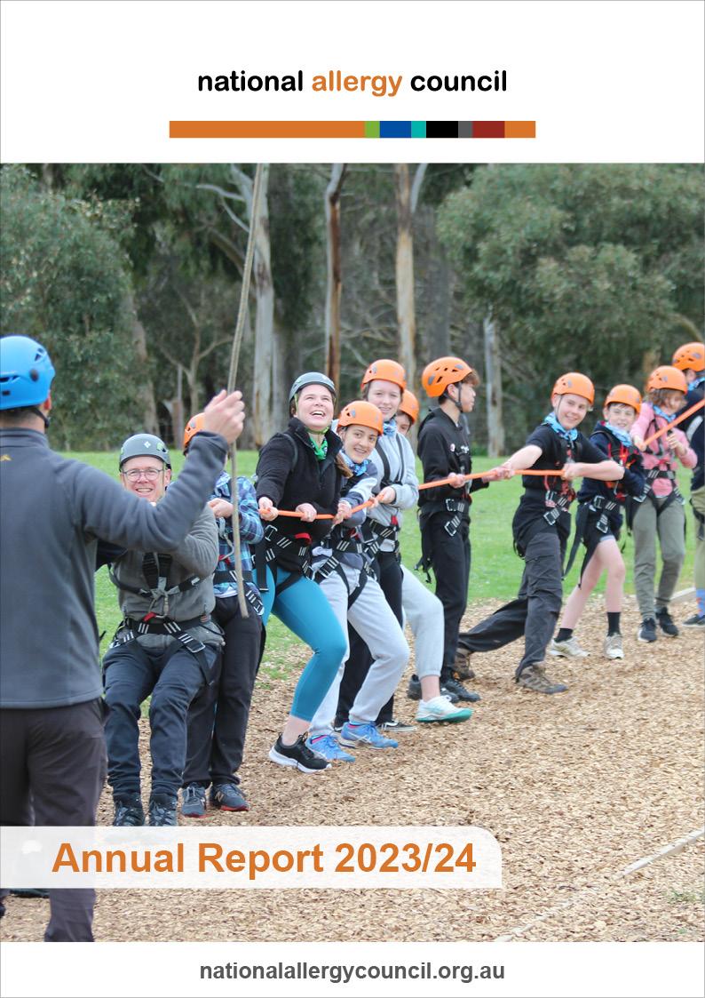 Group of people in helmets and harnesses pulling a rope during an outdoor activity. Text reads "Annual Report 2023/24, nationalallergycouncil.org.au".