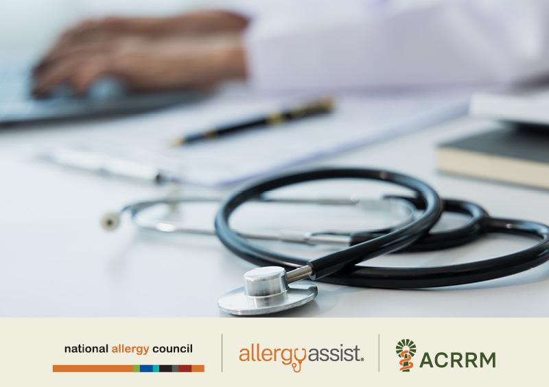 A stethoscope on a desk with a person typing on a laptop in the background. Logos for National Allergy Council, Allergy Assist, and ACRRM are visible.