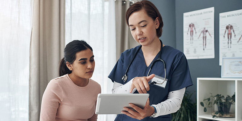 doctor talking to patient